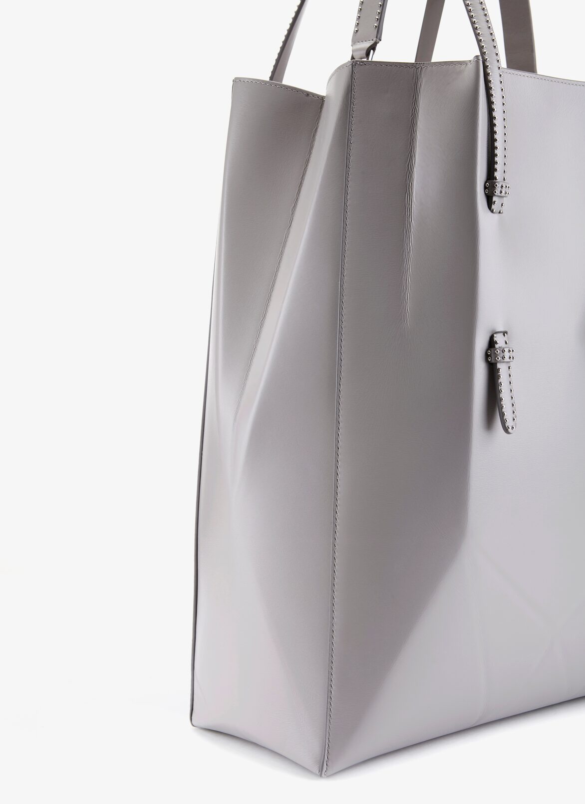 CLOSED BAG IM CUIR LUX BANDE CLOU PEARL ALAÏA PEARL  CLOSED BAG IM CUIR LUX BANDE CLOU PEARL